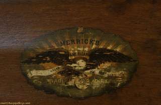 An authentic Victorian country store spool cabinet has a desk top, and 