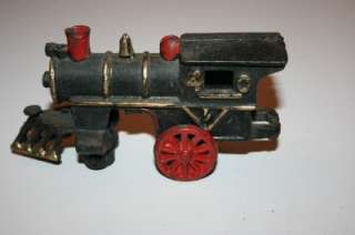 Up for sale is a great looking old cast iron train engine and coal car 