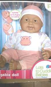 This auction is for AFRICAN AMERICAN baby in PEACH outfit. (Doll is 