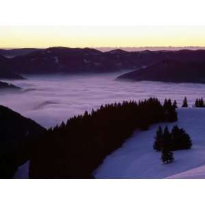  Twilight View of Snow Blanketed Hills with Fog in the 