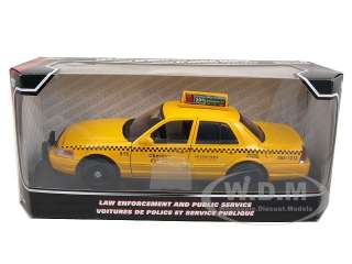   2007 Ford Crown Victoria Checker Taxi Cab die cast car by Motormax