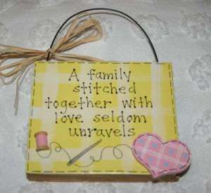 Plaque   A FAMILY STITCHED WITH LOVE SELDOM UNRAVELS  