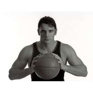  Portrait of Male Basketball Player Holding the Ball 