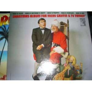   Gun And A Big Christmas Album For Merv Griffin & T.V. Family Merv