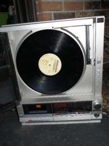   1980s early 1990s. Untested powers up, needle moves, but turntable