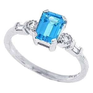  1.01ct Emerald Cut Blue Topaz Ring with Diamonds in 14Kt 