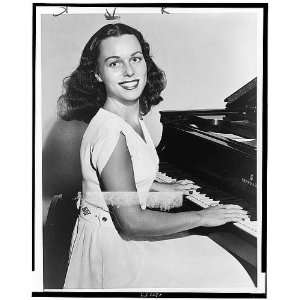  Bess Myerson, seated at piano, 1945 Miss America