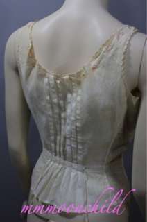 beautiful corset cover from the Victorian era. This piece has the 