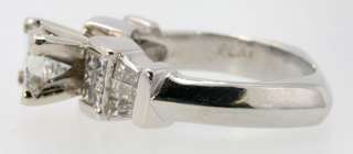   and thick heavy gauge platinum engagement ring measuring 6 95 mm