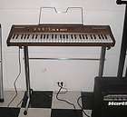 ROLAND ELECTRIC PIANO PLAYER 30 with stand, very nice , great 