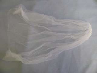 mint condition with swathes of tulle veil bouquet wrist booklet and 