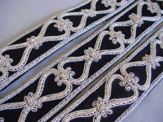 Approximately 1 ½ inches wide. This auction is for 1 yard of trim.