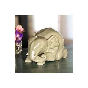   NOVICA Celadon ceramic figurine, Reclining Elephant