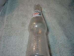 1955 Canada Dry 10 oz. clear soda bottle white green and red logo 
