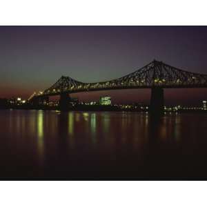  View of Jacques Cartier Bridge over River at Sunset in 