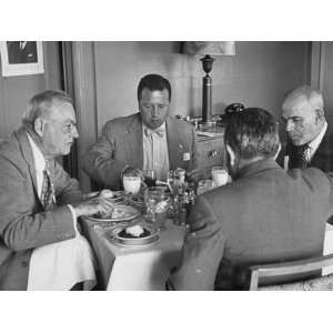  John Foster Dulles Attending a Private Luncheon During the 