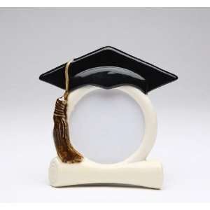   Graduation Hat with Hanging Gold Tassel on White Picture Frame Home