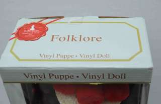   consideration is a new in box Schneider Folklore handmade vinyl doll